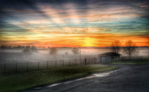 sunset_and_fog_by_noctiferdesigns-d9n7r80.jpg